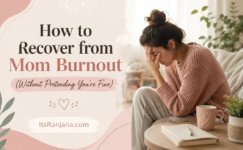 Exhausted mother sitting on a couch with her head in her hands, illustrating mom burnout and emotional exhaustion, alongside the text "How to Recover from Mom Burnout (Without Pretending You're Fine)" on a soft pastel background.